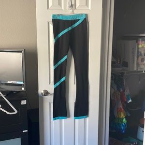Medium black and blue ice-skating pants